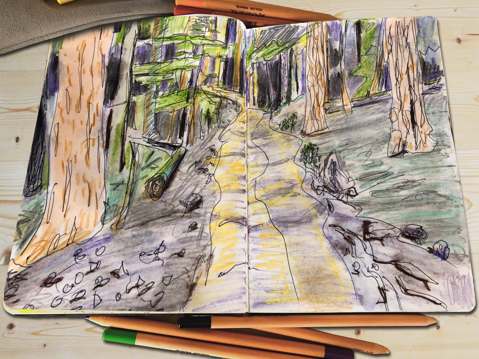 Artist sketching with graphite